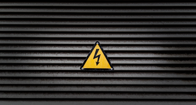 yellow-danger-sign-black-striped-wall_181624-5398